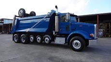 Peterbilt Super Dump Blue - Passenger Front Angle 