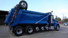 Peterbilt Super Dump Blue - Passenger Rear Angle 