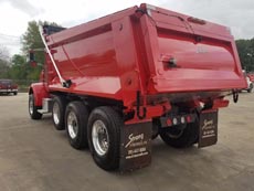 Peterbilt Tri-Axle Dump Truck Mule - Driver Rear Angle 