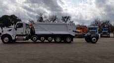 Peterbilt 567 Super Dump - Driver Side Strong Arm Down